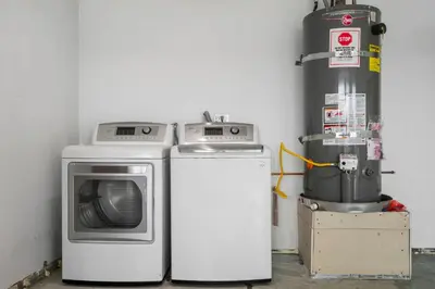 a washer and a dryer and a washing machine at Marbella Lane - Your Cozy Haven 2BR Retreat in West Covina