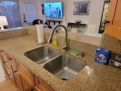 a kitchen counter with a sink in a kitchen at A Tranquil Retreat in Tarzana CA in Tarzana