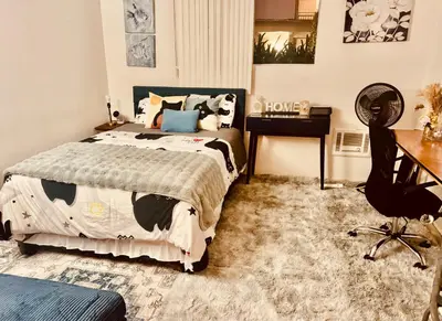 a bedroom with a bed and a desk at Beach lovely home in Santa Monica in Los Angeles