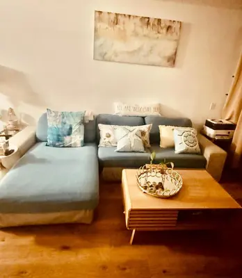 a living room with a couch and a coffee table at Beach lovely home in Santa Monica in Los Angeles
