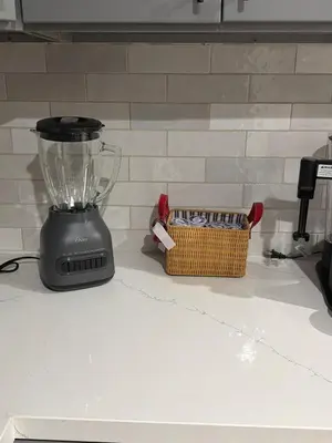 a blender sitting on a counter next to a basket at Welcome To The Modern Casita Riverside! in Riverside