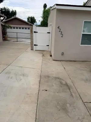 a garage with a white door and some graffiti on it at Welcome To The Modern Casita Riverside! in Riverside