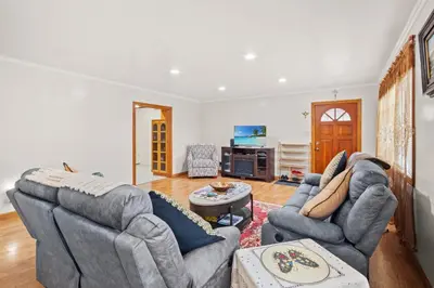 a living room with two couches and a table at Fireplace Evenings • Smart TV • Sleeps 7 in Carson