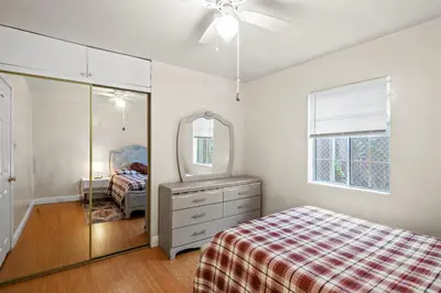 a bedroom with a bed and a dresser and a mirror at Fireplace Evenings • Smart TV • Sleeps 7 in Carson
