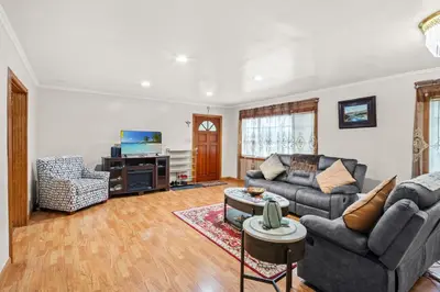 a living room with two couches and a tv at Fireplace Evenings • Smart TV • Sleeps 7 in Carson