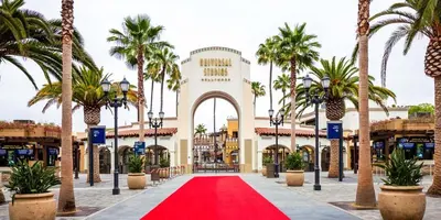 a red carpet in front of a mall with palm trees at Walk to Shoreline Village, BBQ in Prime Location in Long Beach