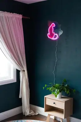a neon worm on the wall in a room at Lovely Culver City Home 8 Mins to Beach Close to LAX in Los Angeles