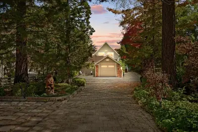 a driveway leading to a house with a garage at Home Sweet Home in Big Bear Lake