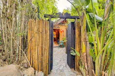 an entrance to a wooden fence with a wooden gate at 2 Mi to Echo Park Funky Silver Lake Studio in Los Angeles