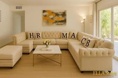 a living room with a couch and a table at Rowland Heights Cozy & Quiet Home in Rowland Heights