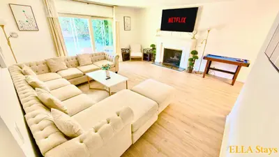 a living room with a couch and a piano at Rowland Heights Cozy & Quiet Home in Rowland Heights