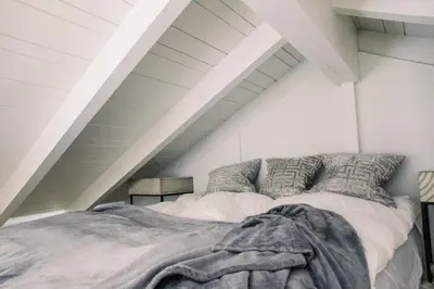 a bedroom with a bed in a attic at 2BR Luxury Villa in West Hollywood with Private Pool in Los Angeles