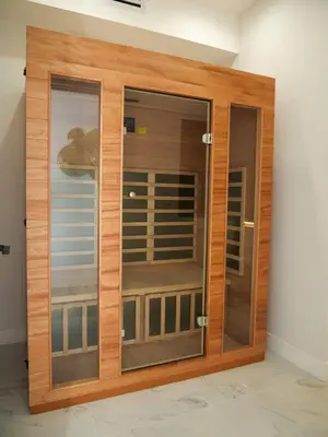 a wooden display cabinet with glass doors at Sleek 7BR Exquisite Estate Resort Pool, Sauna, Spa 6500 SQF in Woodland Hills