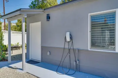 a house with a phone on the side of it at A Fresh, Relaxing Oasis Near Monrovia Canyon Park in Duarte