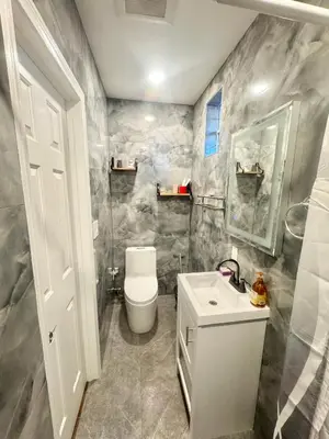 a bathroom with a toilet and a sink at Asian Food Galler Single house in San Gabriel