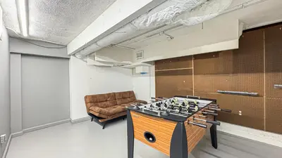 a room with a chess board and a couch at Charming 4-Bedroom Home Near Bel Air - BG - WW in Los Angeles