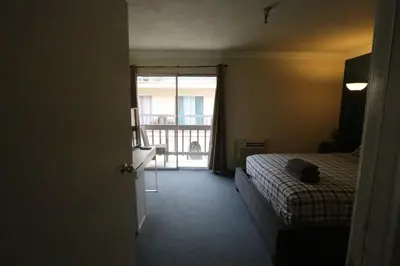 a hotel room with a bed and a window at Beverly Hills Queen Bed Studio in Los Angeles
