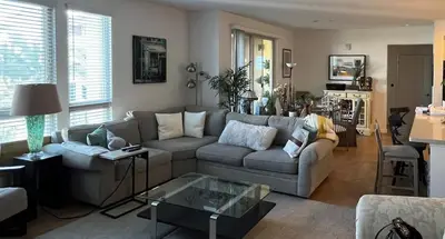 a living room with a couch and a table at Sweet Beautiful 2 bedrooms home in Los Angeles