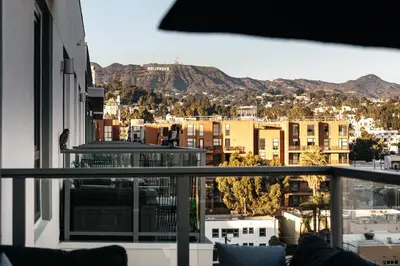 a view of a city from a balcony at Hollywood Celebrity 2 Bd with SkyLine and Hollywood Sing View in Los Angeles