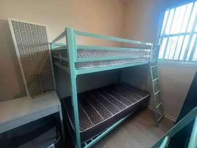 an empty bunk bed in a room at Sunny LA Bunk Bed in Los Angeles