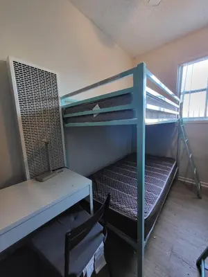 a room with a bunk bed and a desk at Sunny LA Bunk Bed in Los Angeles