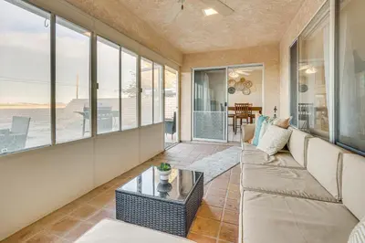 a living room with a couch and a table at Golf, Fish and More! Peaceful Home in Helendale in Helendale