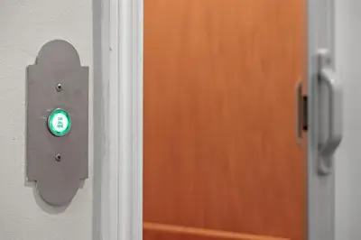 a close up of a door with a green light at 4br Beach House Steps from Beach with AC Parking BBQ in Hermosa Beach