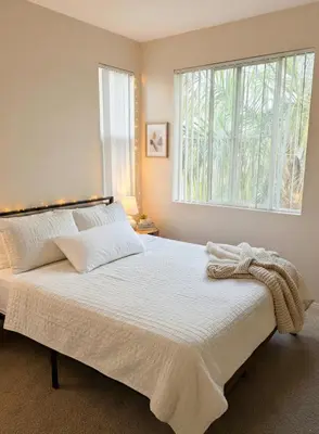 a bedroom with a large bed with a window at Marina Del Rey Heavenly Stay in Los Angeles