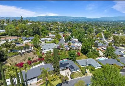 an aerial view of a small town with houses at stunning Poolside villa