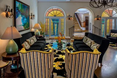 a living room with two couches and a table at The Sovereign in Los Angeles