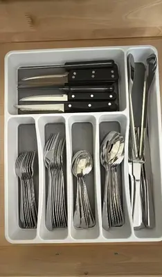 a plastic container with utensils in a drawer at Luxurious Pasadena Home w Parking & Near Old Town in Pasadena