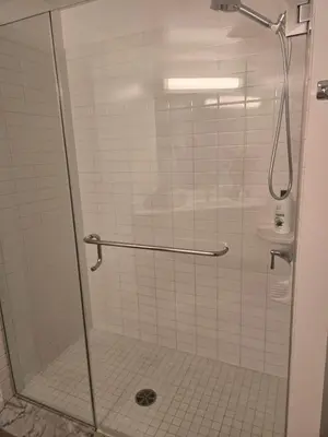 a shower in a bathroom with a glass door at 2 Bedroom with City Views in Los Angeles
