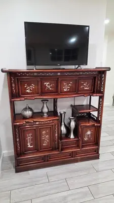 a wooden entertainment center with a television on top at Modern 2BR Guest Suite w En-Suite Bathrooms 10 min to Rodeo Drive Near Kaiser and Cedars hospitals in Los Angeles