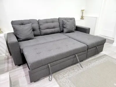 a grey couch in a living room with at Modern 2BR Guest Suite w En-Suite Bathrooms 10 min to Rodeo Drive Near Kaiser and Cedars hospitals in Los Angeles