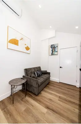 a living room with a couch and a table at Stellar Sherman Oaks One Bedroom close to Universal Studios in Burbank