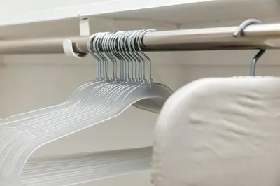 a metal towel rack with a white towel at Serene Urban Haven in Los Angeles