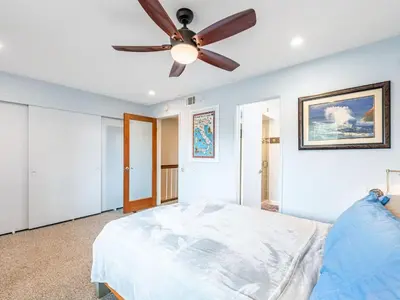 a bedroom with a ceiling fan and a bed at Apartment Meerblick Eigentumswohnung gegenüber dem Strand by Interhome in Port Hueneme
