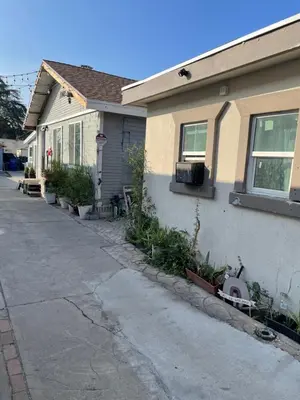 a house with a sidewalk in front of it at Hidden Gem in San Bernardino