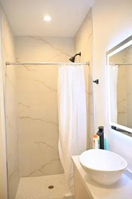 a bathroom with a sink and a shower at Calm Luxe Ensuite Room near USC-Shared Home in Los Angeles