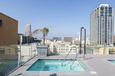 a swimming pool on the roof of a building at DTLA Boutique Loft w Rooftop Pool Hot Tub in Los Angeles