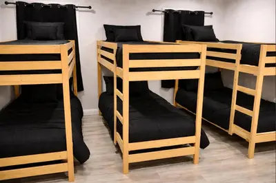 a group of bunk beds in a room at Pickford Vibe near Beverly Hills in Los Angeles