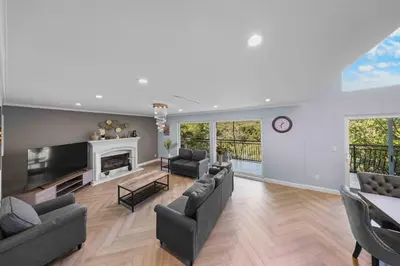 a living room with couches and a fireplace at Tranquil Hideaway Private Retreat with Mountain Views in Tujunga