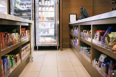 a grocery store aisle with shelves of food at Hyatt House Ontario Airport in Ontario