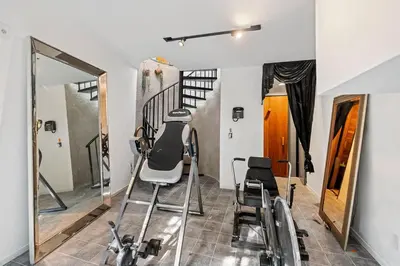 a room with two folding stools and a mirror at The Sinatra House- Fully Furnished! in Los Angeles