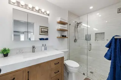 a bathroom with a shower and a toilet and a sink at 1BR 1BA Kitchenette, Arcade, Patio BBQ, Fire Pit in Simi Valley