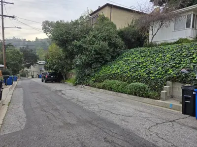 an empty street in front of a house at Private Studio City Suite Walk to Universal-15 min in Los Angeles