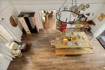 an overhead view of a living room with a table at The Willow Cabin in Big Bear Lake