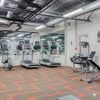 a gym with treadmills and elliptical machines at Evera Residence- 1Bed with Free Parking, Pool and Sauna in Los Angeles