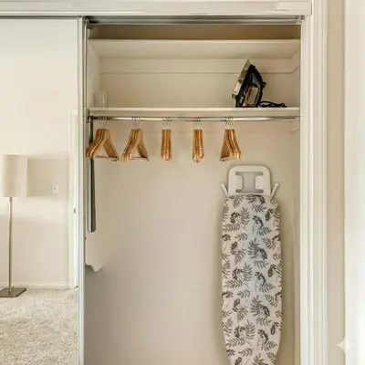 a closet with a fire hydrant hanging from a door at Evera Residence- 1Bed with Free Parking, Pool and Sauna in Los Angeles