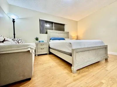 a bedroom with two beds and a window at Proper Stays at Melrose - West Hollywood Premium R suite in Los Angeles